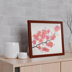 Framed artwork of cherry blossoms on a wooden surface with a gray tiled wall background