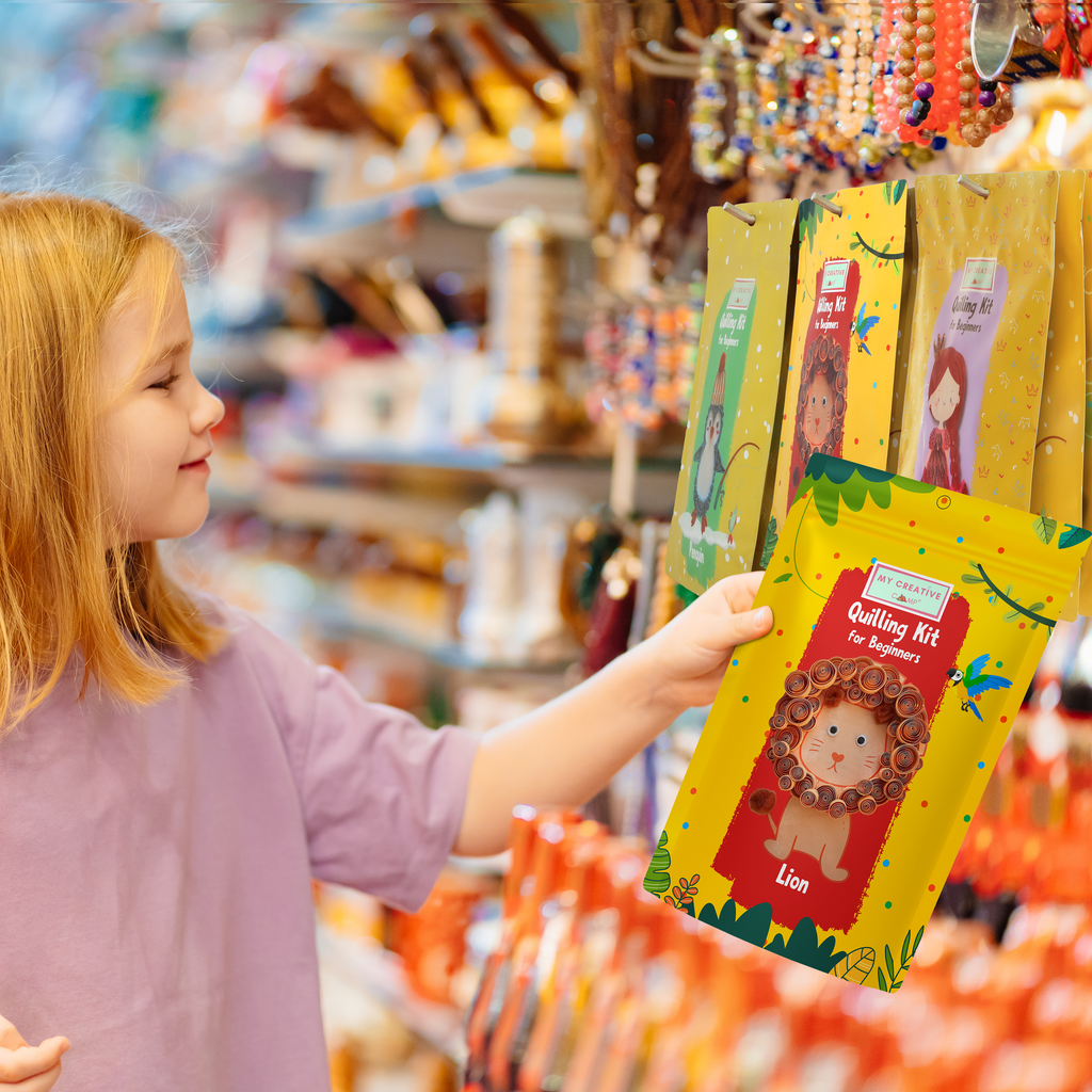 Child holding a lion-themed craft kit in a store setting
Child holding a lion paper quilling kit designed for intermediate crafting projects