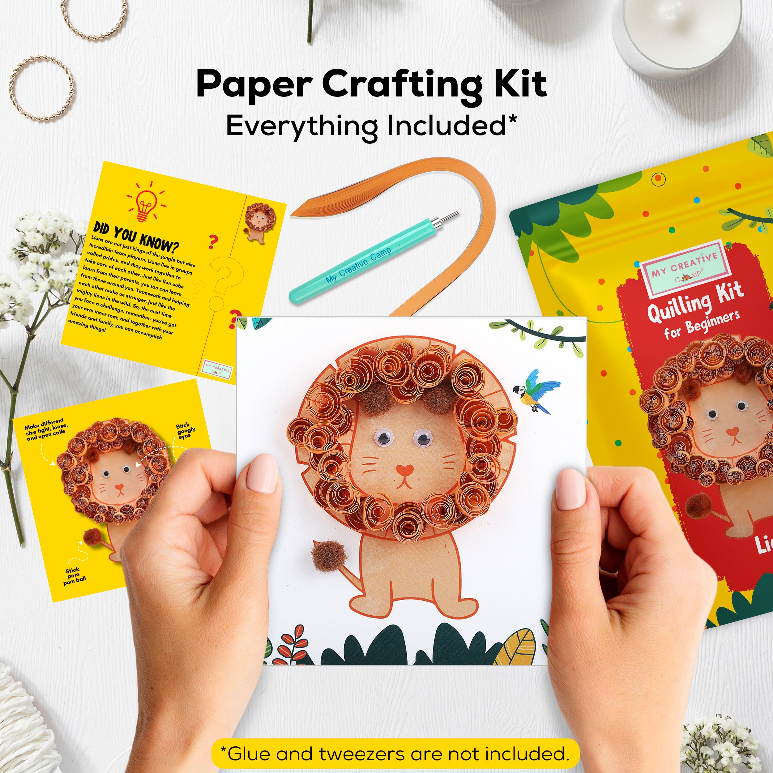 Paper crafting kit with lion design, including materials and tools on a white background.
Finished lion paper quilling art made with an intermediate paper craft kit