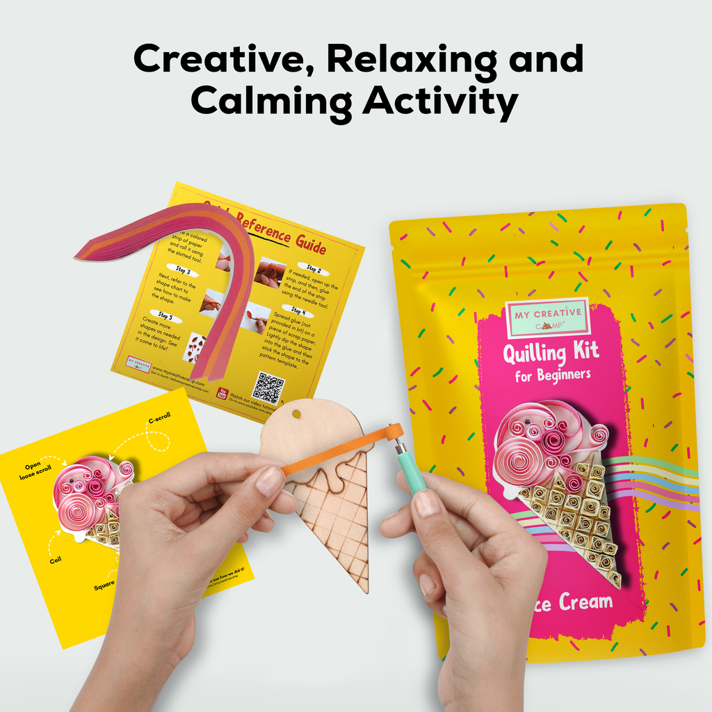 Quilling kit with materials and tools for creative activity on a white background