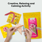 Quilling kit with materials and tools for creative activity on a white background