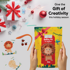 Quilling kit for beginners with lion design held by hands, surrounded by Christmas decorations on a white background.
Paper quilled lion displayed on a stand as handmade desk or shelf decor