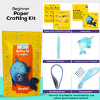 Beginner paper crafting kit with narwhal design, tools, and accessories on a white background.
Intermediate paper quilling kit contents including narwhal template board, quilling paper strips, tools, and instructions
